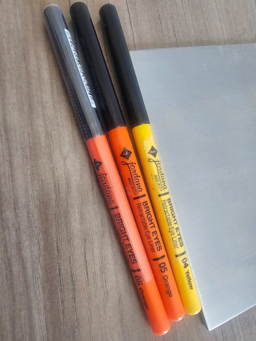 3x  Bright Eyes Retractable Eye Liner 2 Orange (05) & 1 Yellow (04)
